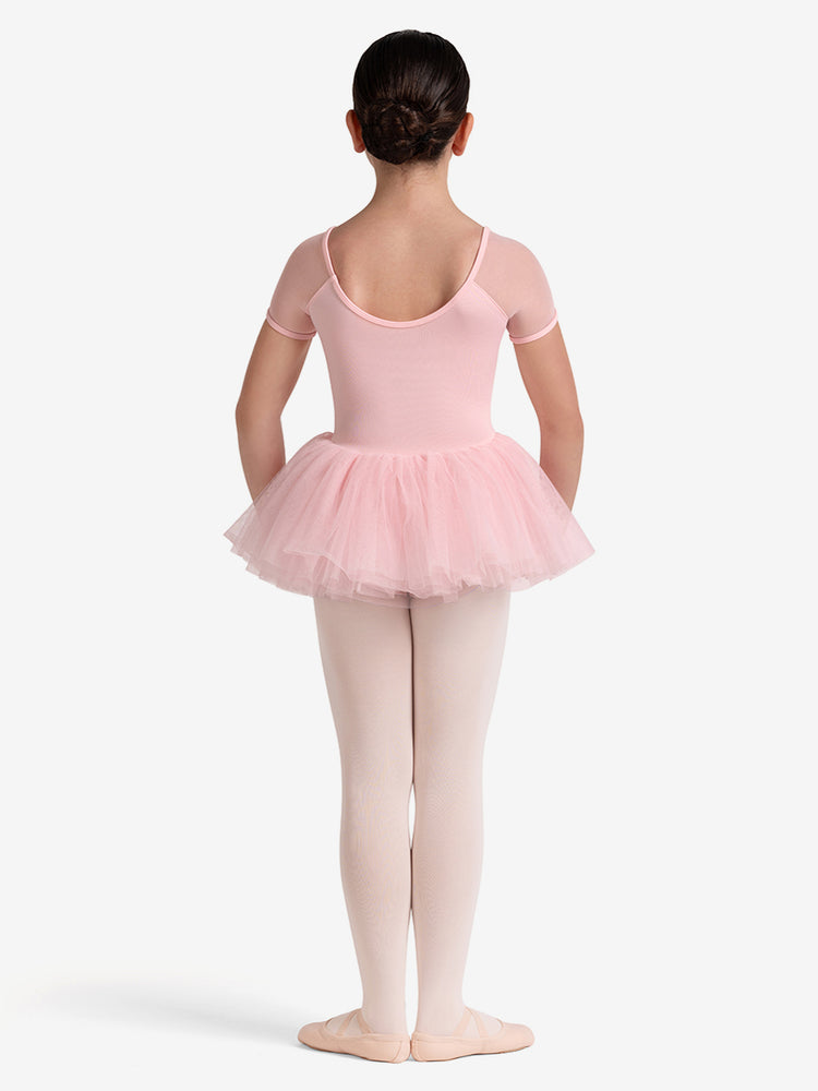 
                      
                        Young girl in a pink ballet outfit with a tutu on a white background
                      
                    
