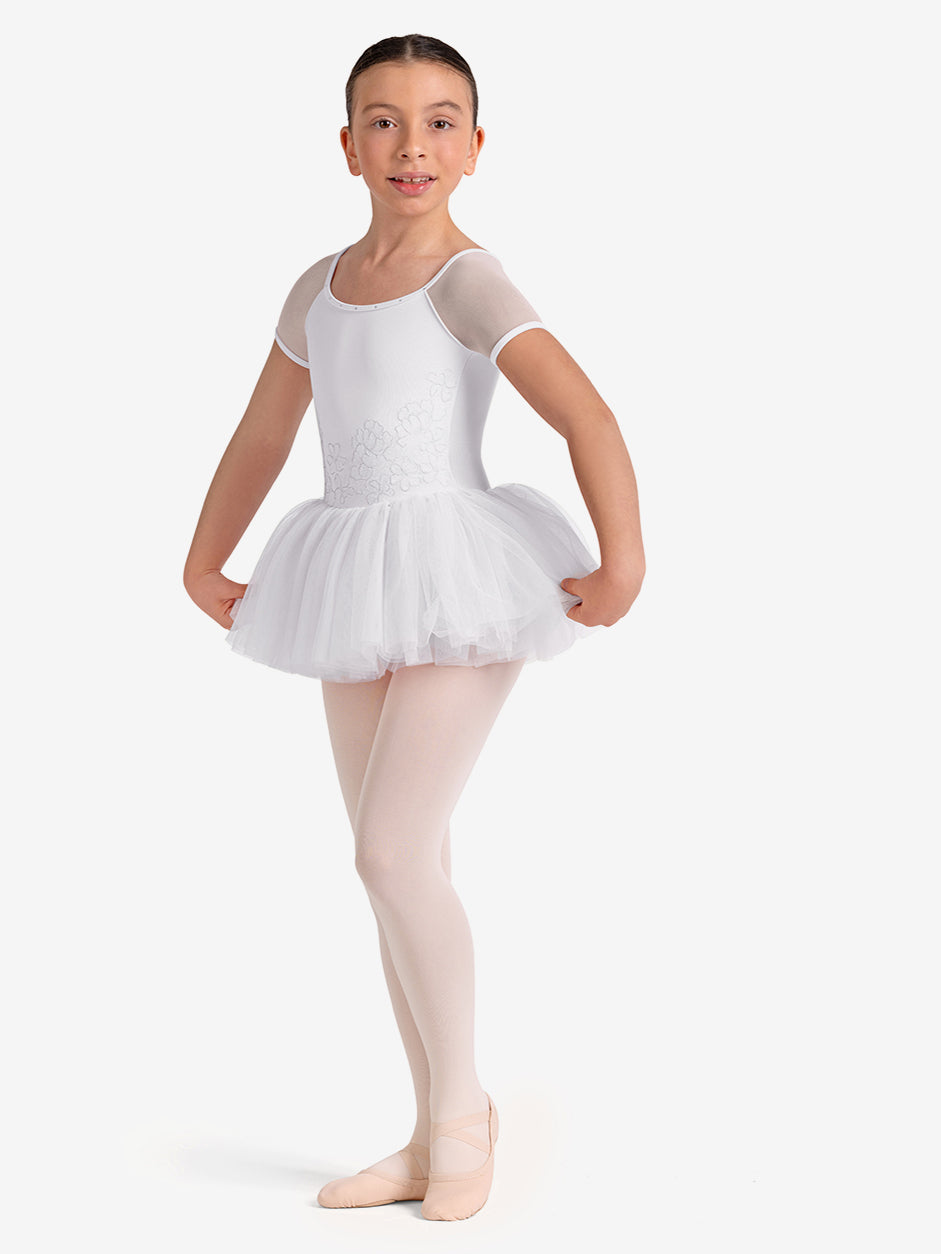 Young girl in a white ballet outfit on a white background