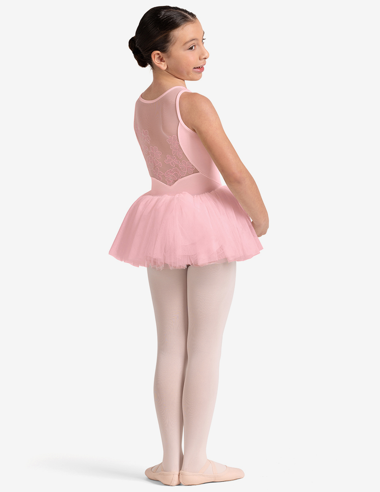 
                      
                        Young girl in a pink ballet tutu dress on a white background
                      
                    