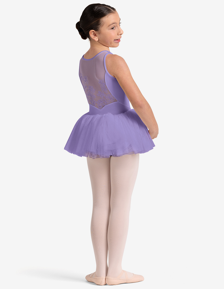
                      
                        Young girl in a lilac ballet tutu dress leotard on a white background
                      
                    