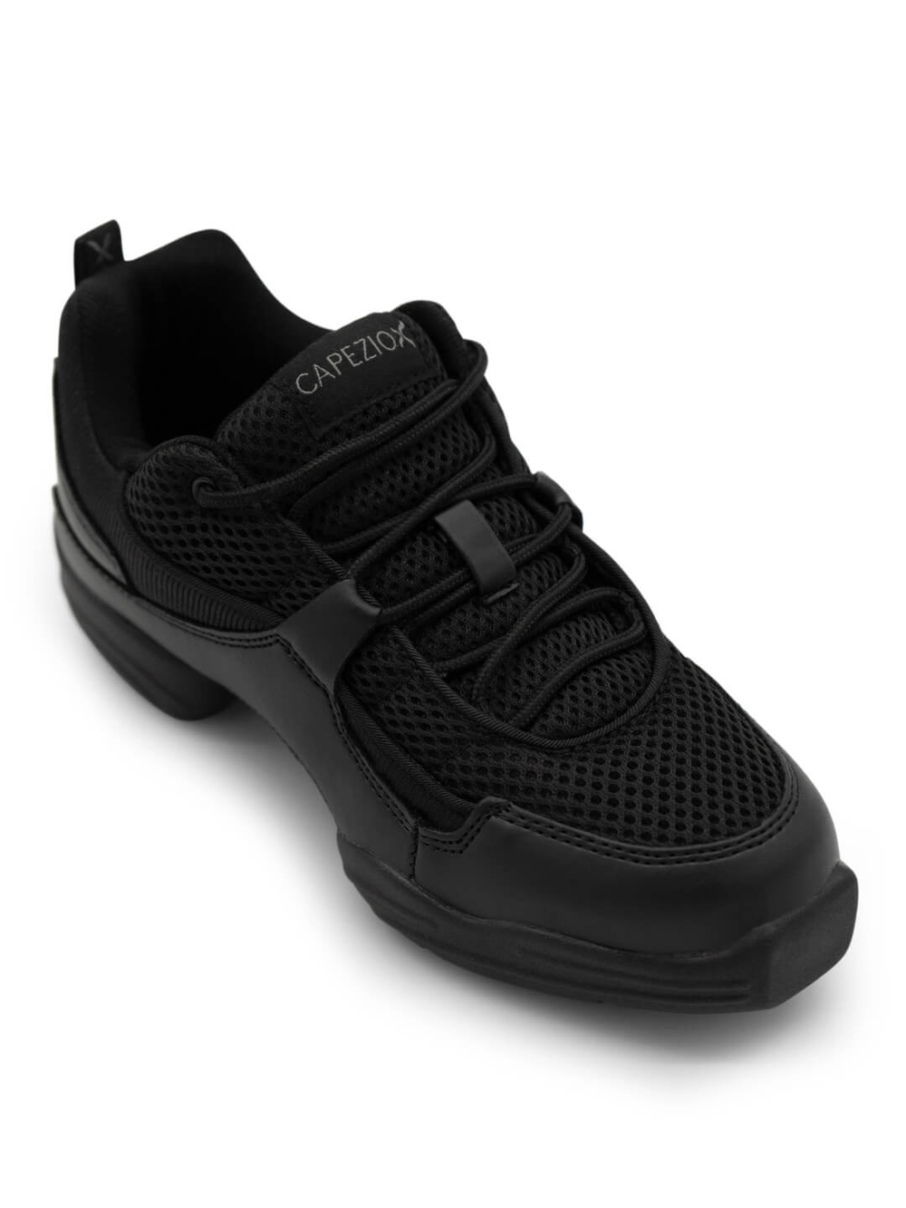 Close-Up of a black sneaker with mesh upper and a split-sole. Capezio logo on the tongue.