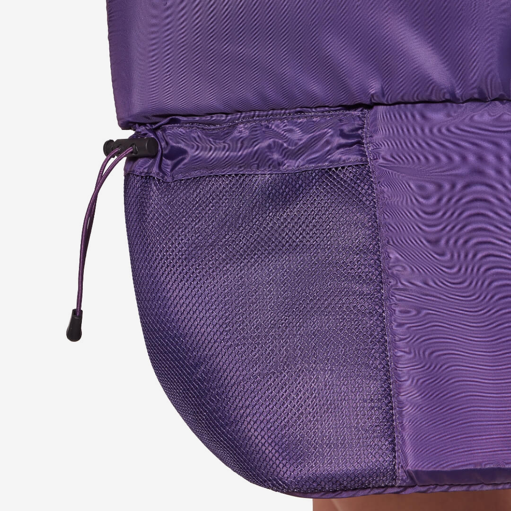 Close-up of a purple bag with a mesh sleeve on a white background