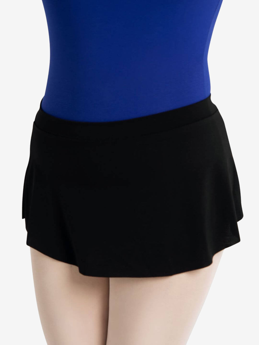 A close-up of a person from the waist to the thigh wearing a royal blue top and black, pull-on, curved skirt, against a plain light grey background.