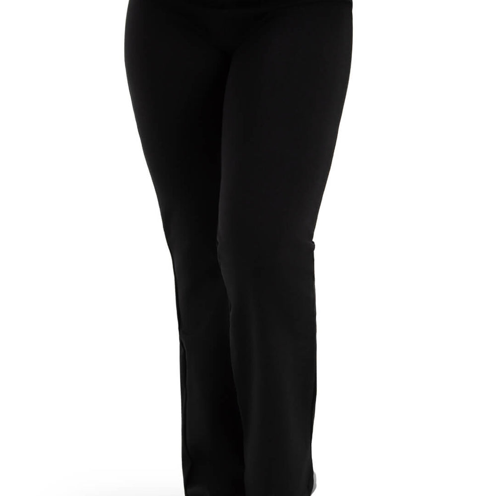 
                      
                        A child standing barefoot, showcasing a pair of black, full-length yoga pants. The pants have a slight flare at the bottom and fit snugly through the hips and thighs. The image focus is on the pants, with the person's upper body out of frame.
                      
                    