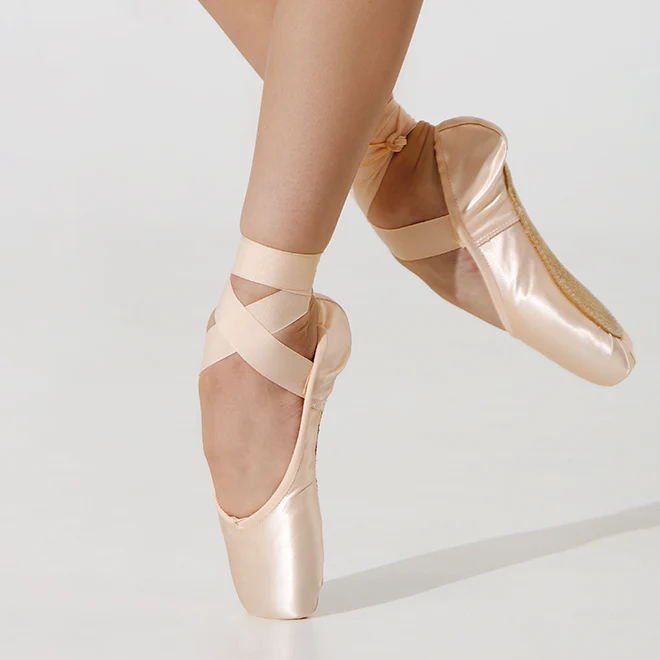 Pointe shoes with ribbons on a white background