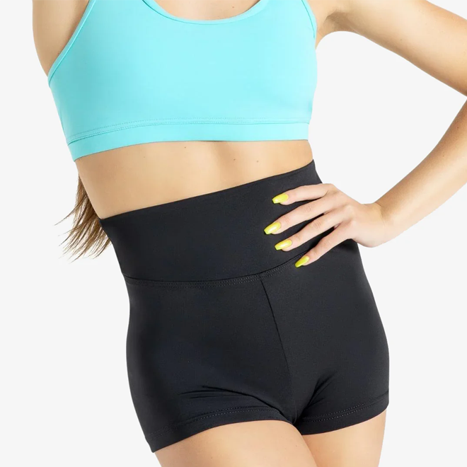 Person wearing a light blue sports bra and black high-waisted shorts on a white background