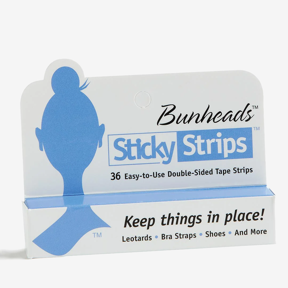
                      
                        A single white box of Bunheads Sticky Strips featuring a blue silhouette of a dancer's head, hair in a bun, it reads KEEP THINGS IN PLACE! Plain background.
                      
                    