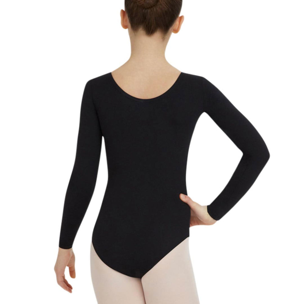 The back of a young dancer with hair in a ballet bun stands with one hand on her hip, wearing a scoop neck back, long sleeve, black leotard, and ballet pink tights.